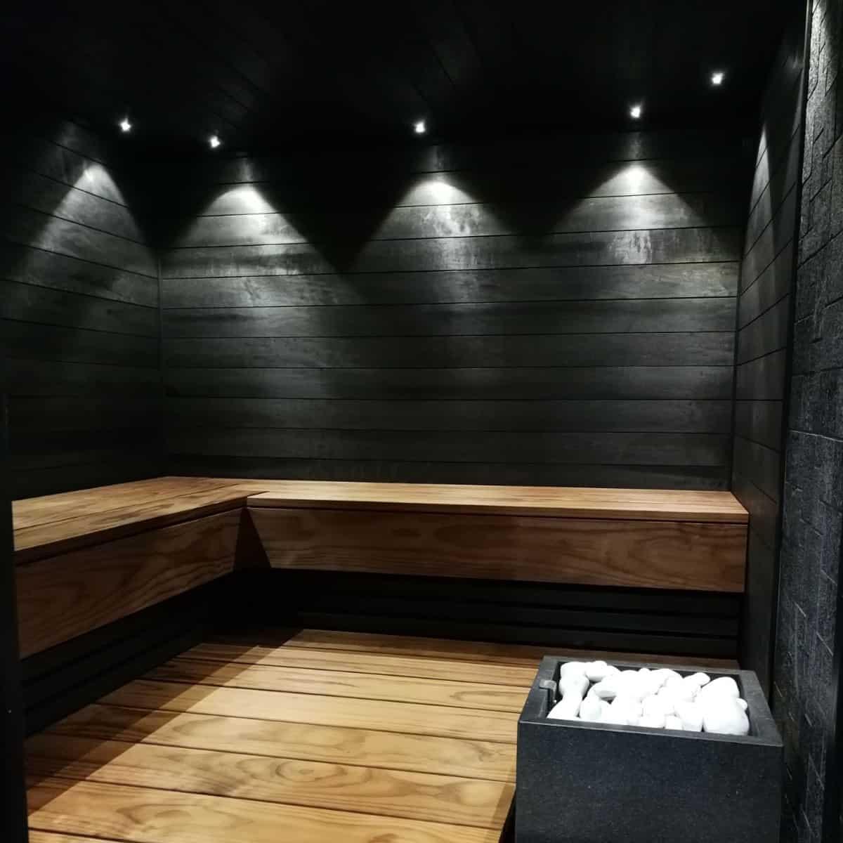 Interior decoration of sauna with wooden panels