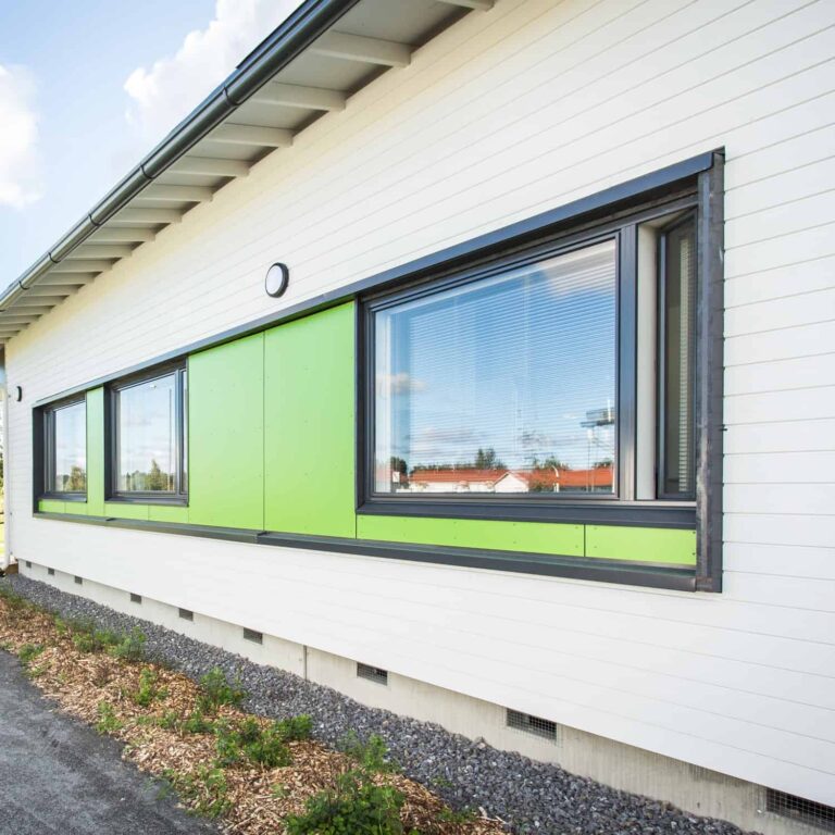 Fire-resistant Topcoat-V exterior cladding panel. Kyrönmaa Service Home